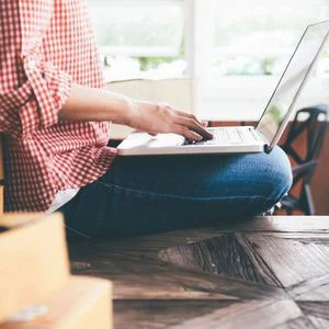 person using laptop computer